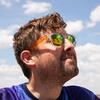 Steve Nesbitt in the field watching a weather balloon release. Photo by Amelia Holowaty Krales / The Verge
